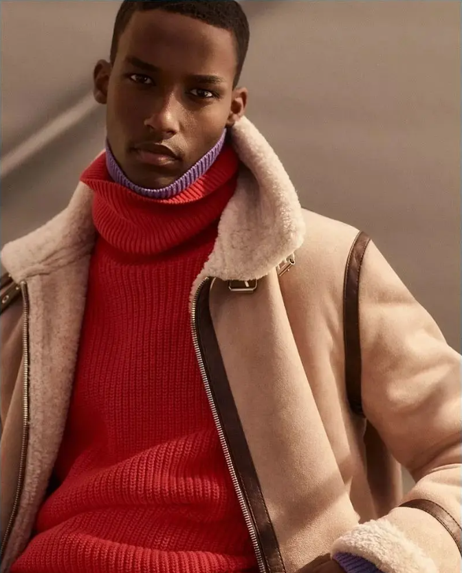 man in red high-neck pullover