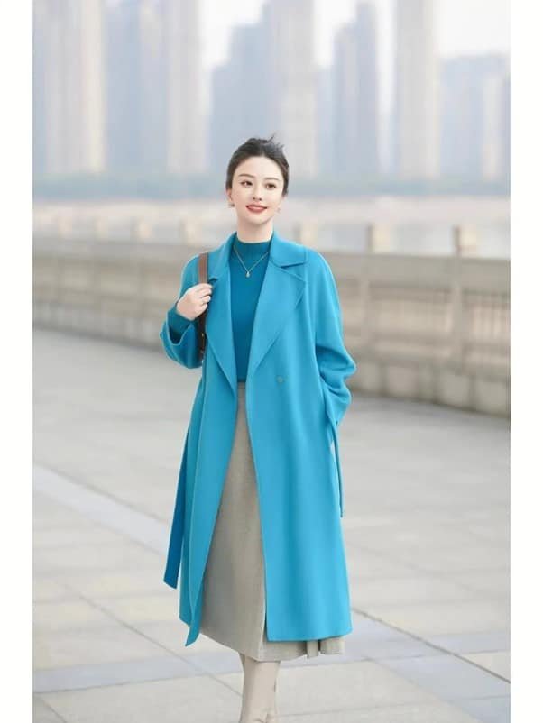 a sweater and a cost in the same color range