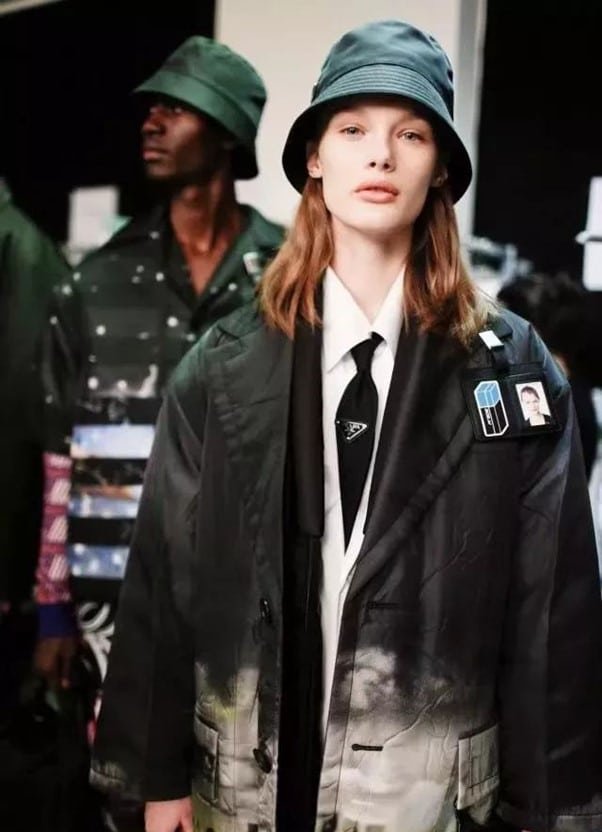 Dark-colored bucket hats + lined coats, windbreakers