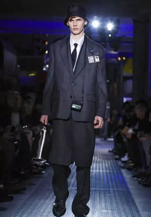 Dark-colored bucket hats + suits