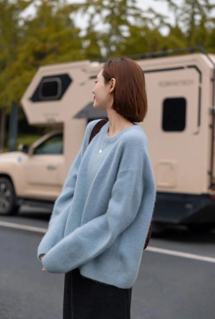 light blue sweater