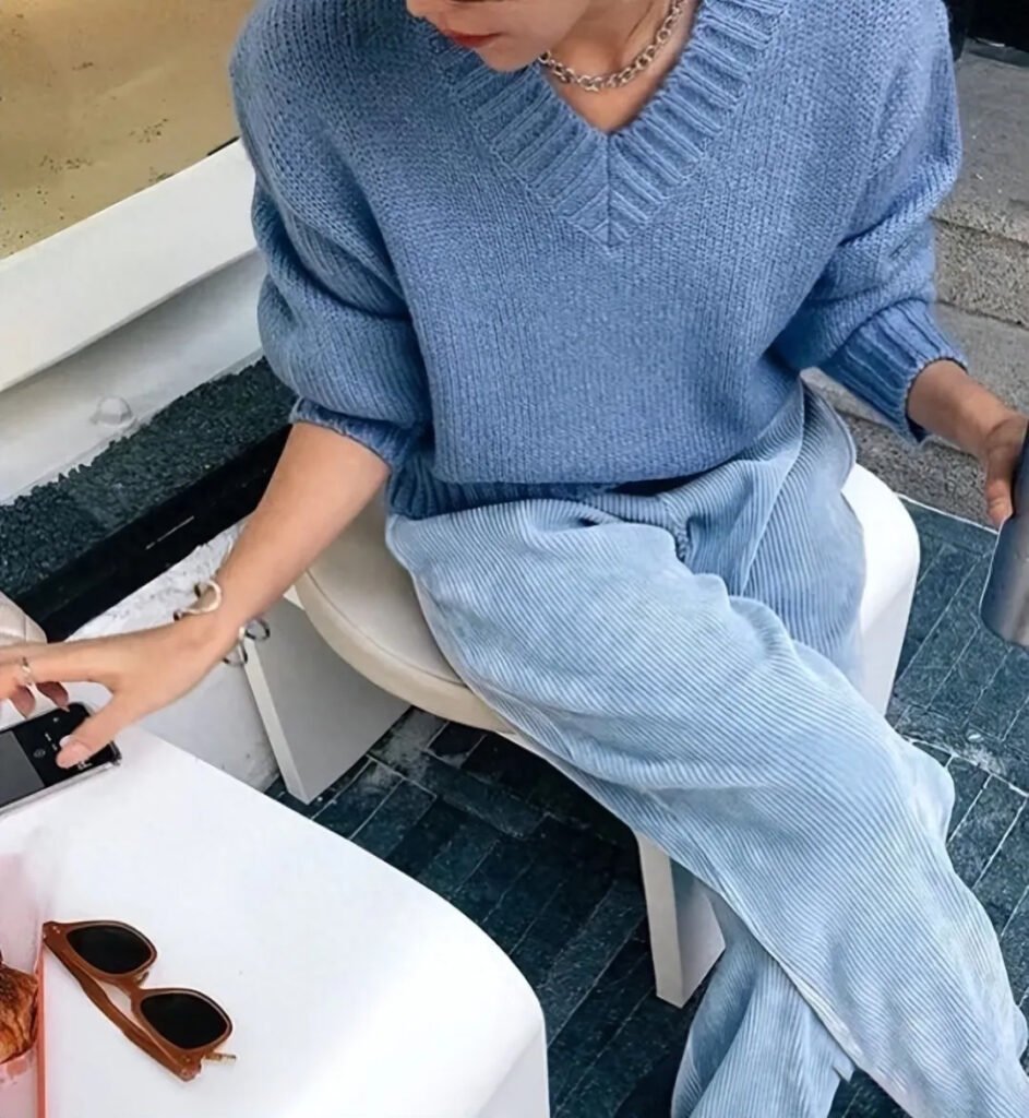 light blue sweater