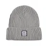 Bonnets gris unis à revers tissés PB-FB0004
